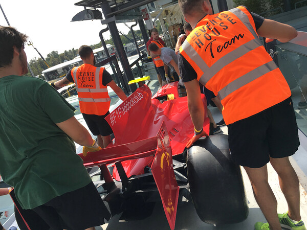 The Events House Team Moving F1 Car